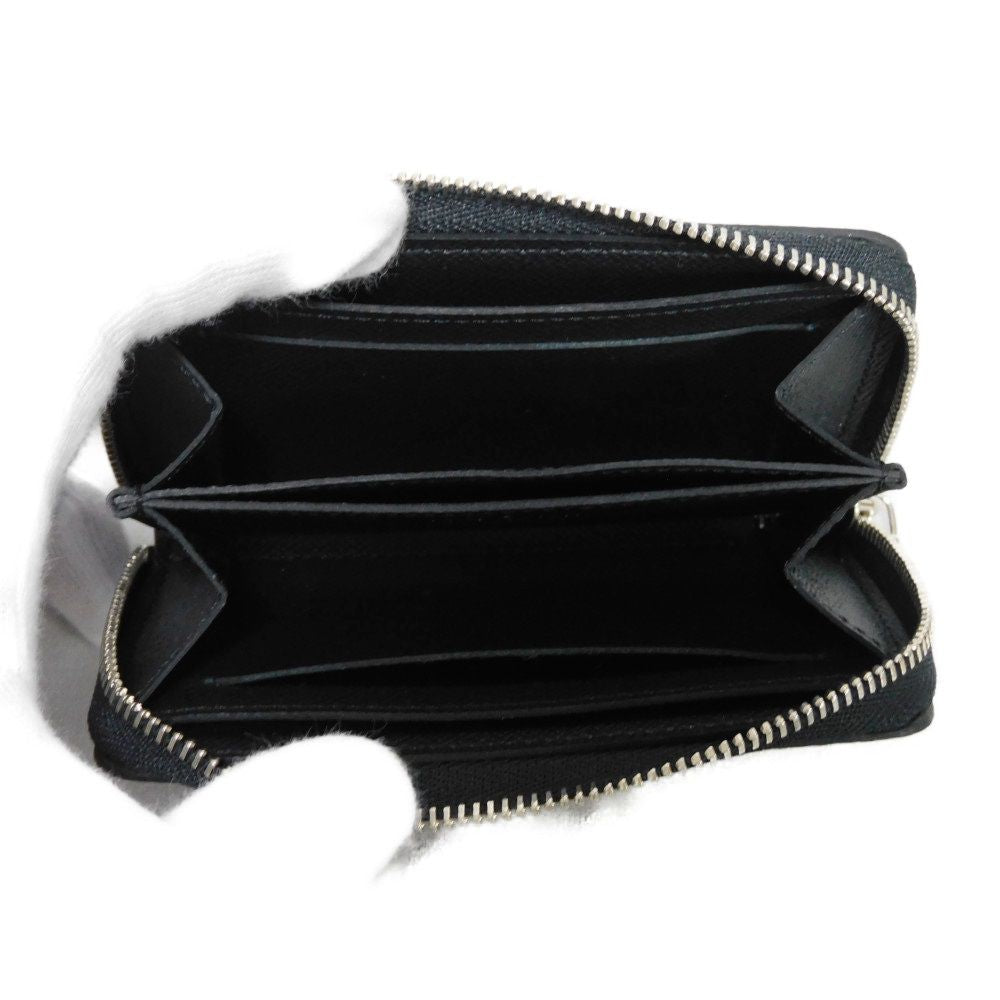 LOUIS VUITTON Coin case M30511 Taiga leather (embossed) Noir New LV logo embossed black Zip Around Taiga Zippy coin purse mens