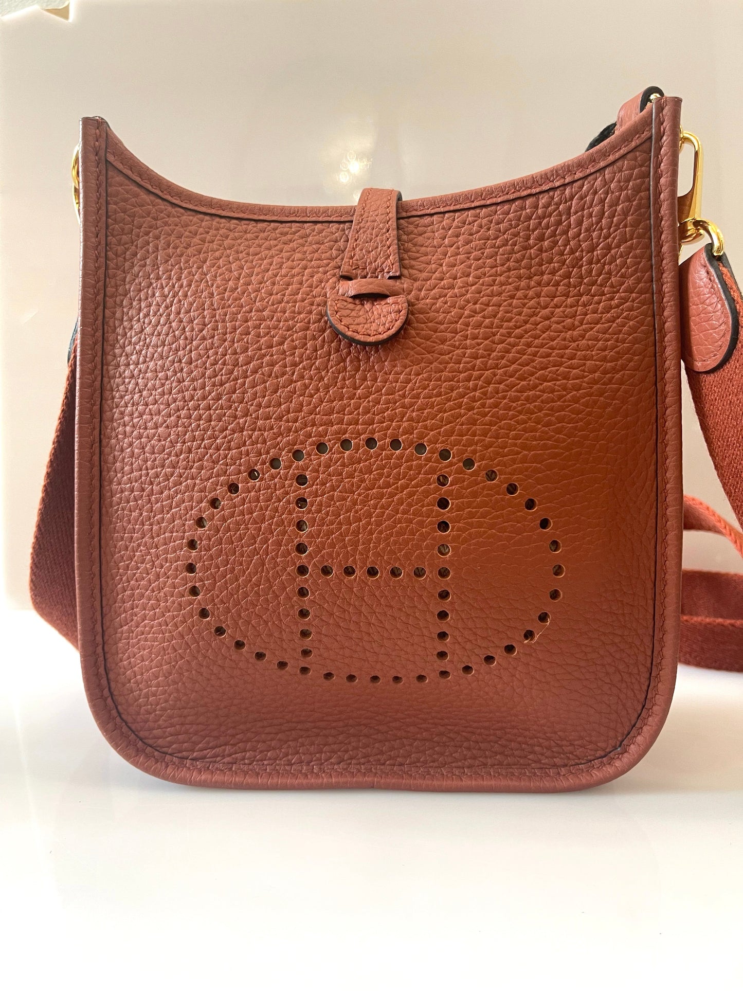 HERMÈS CLEMENCE MINI EVELYN TPM CROSSBODY BAG IN ROUGE PIVOINE
