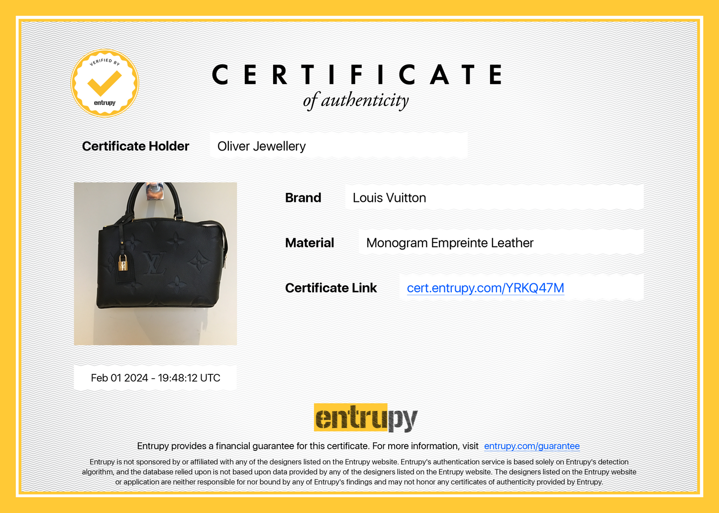 Louis Vuitton Black Monogram Empreinte Leather Petit Palais