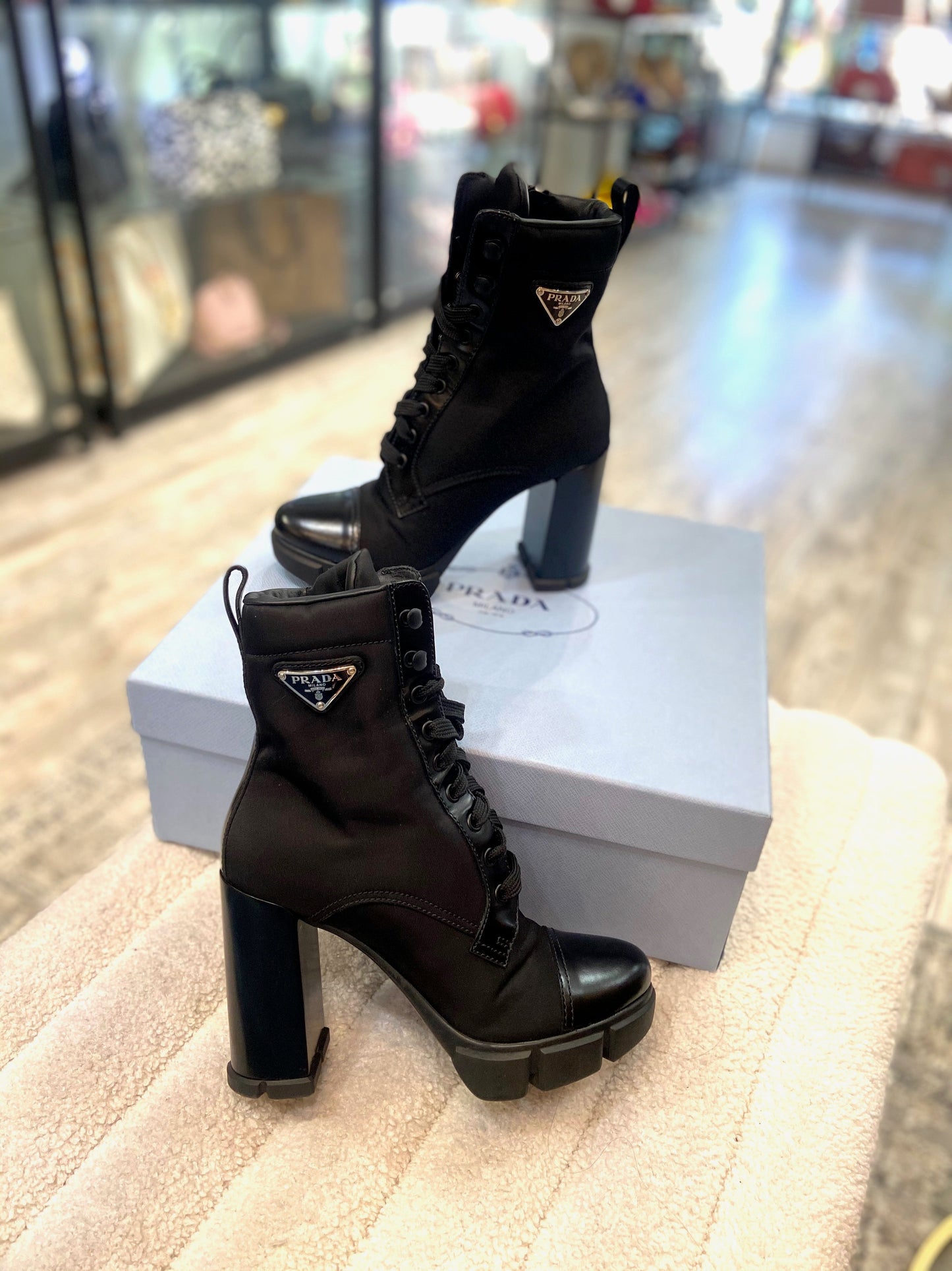 PRADA MONOLITH RE-NYLON TRIANGLE LOGO ANKLE BOOTS