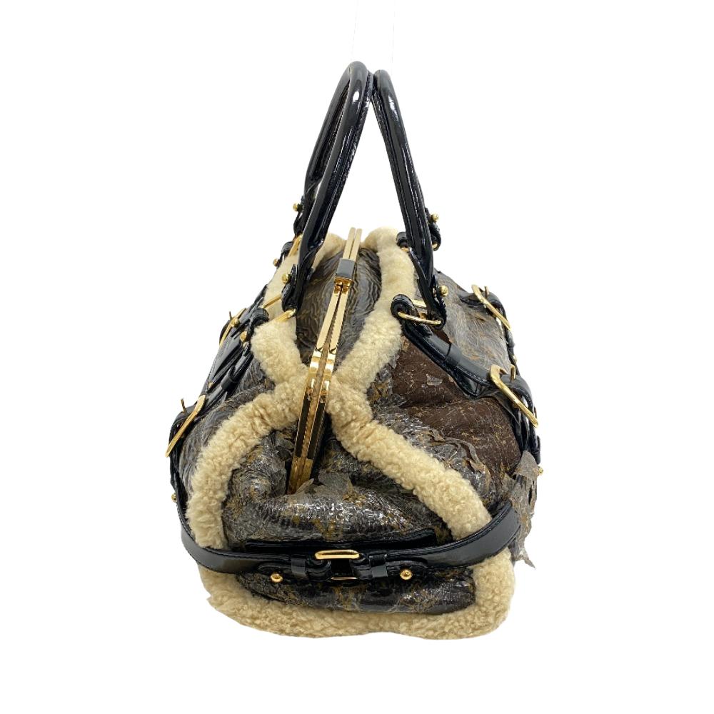 LOUIS VUITTON Mini Boston Duffel bag M95574 Patent Leather, Sheepskin Brown Handbag monogram shearling storm Women