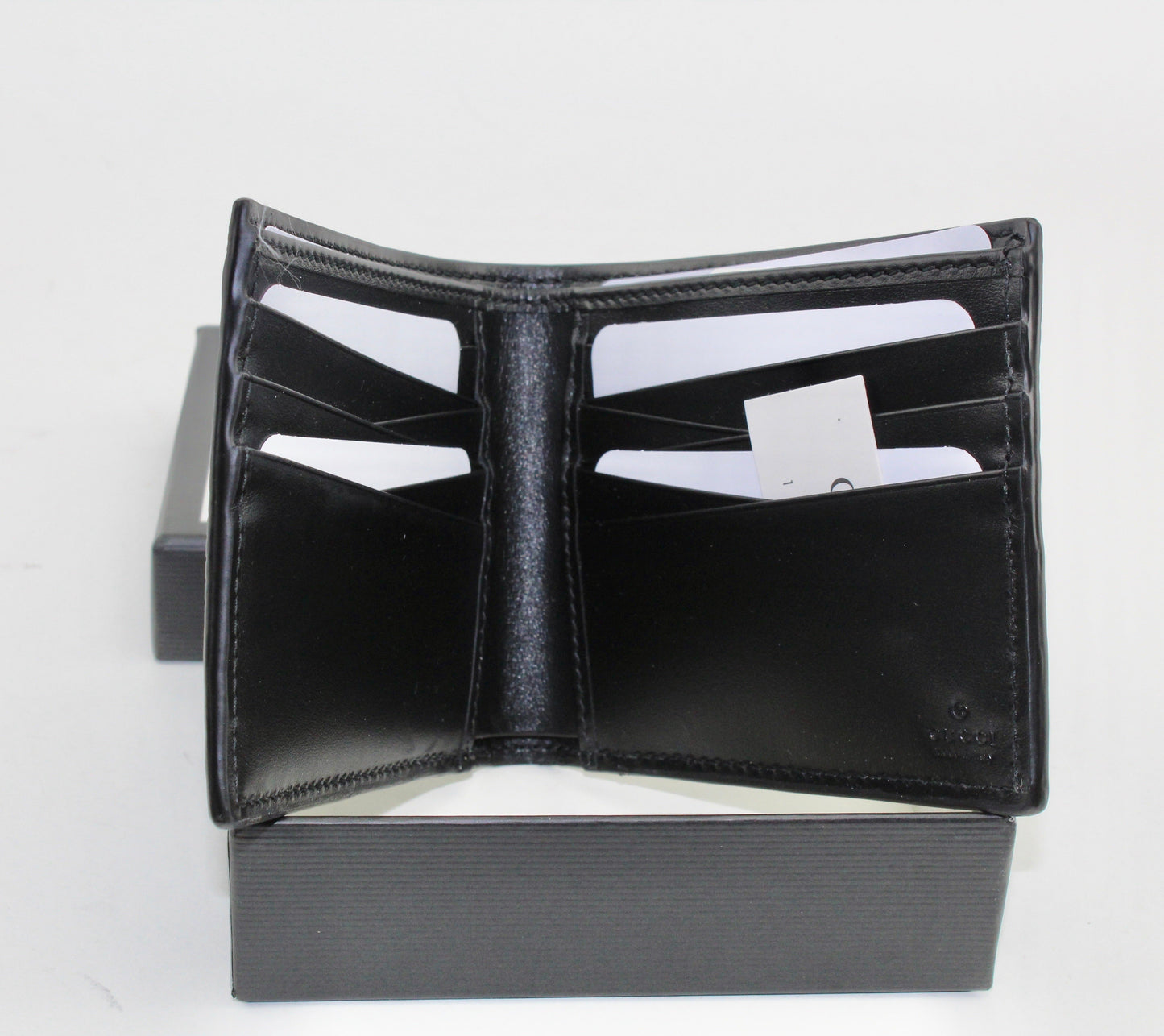 GUCCI GG EMBOSSED WALLET