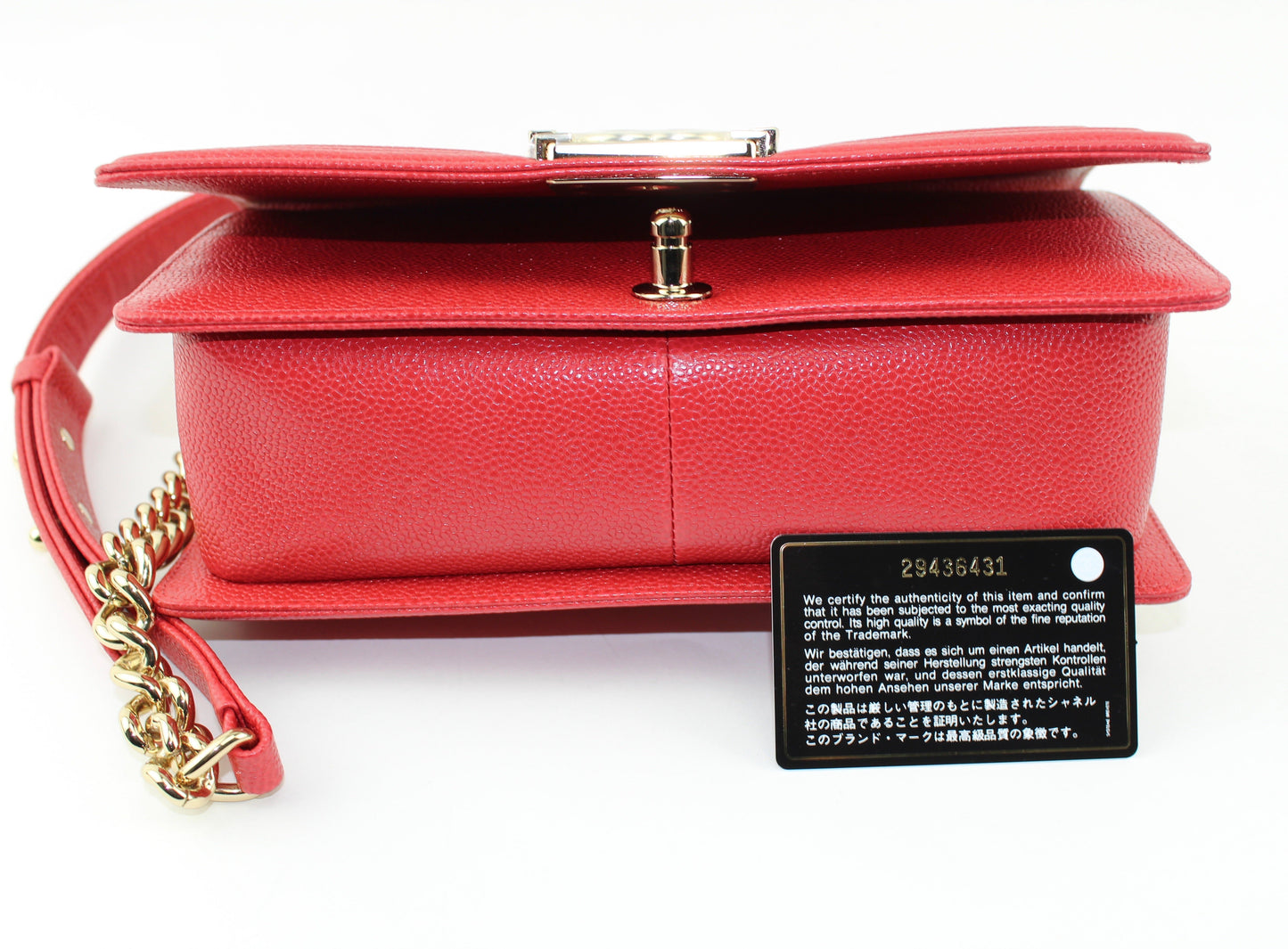 CHANEL MEDIUM CAVIAR BOY BAG IN RED