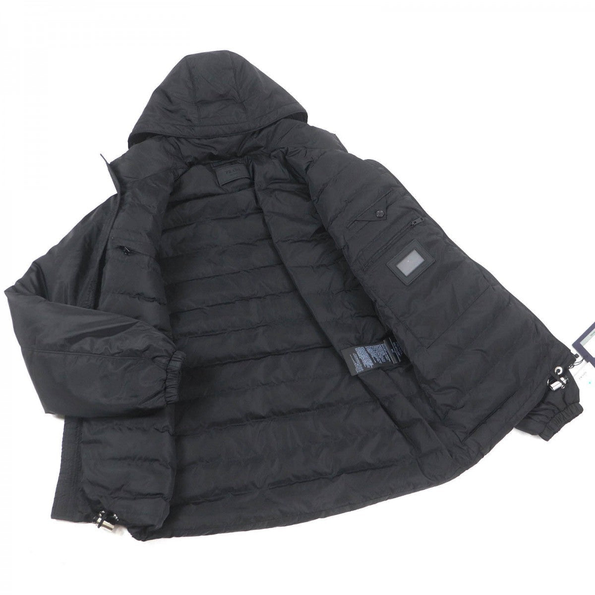 PRADA Down jacket SGN955 Main: 100% recycled nylon, Filling: 40% down, Filling: 33% recycled polyamide, Filling: 27% polyester, Leather part: Lambskin black mens 50