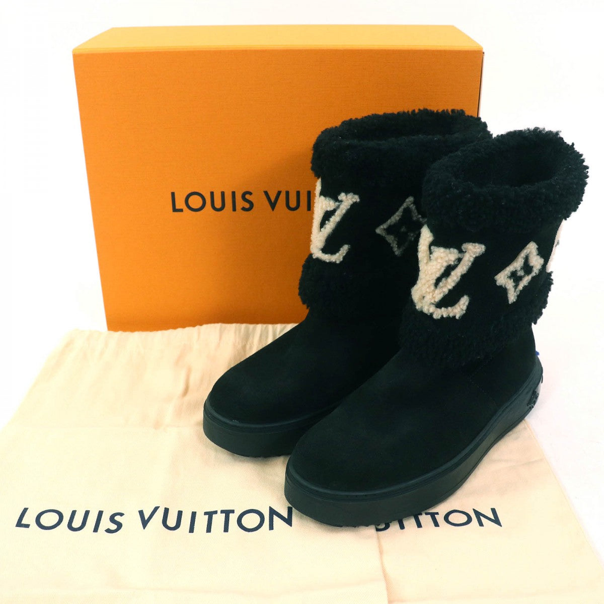 LOUIS VUITTON Ankle boots Mouton Black Ivory snowdrop line 37.5