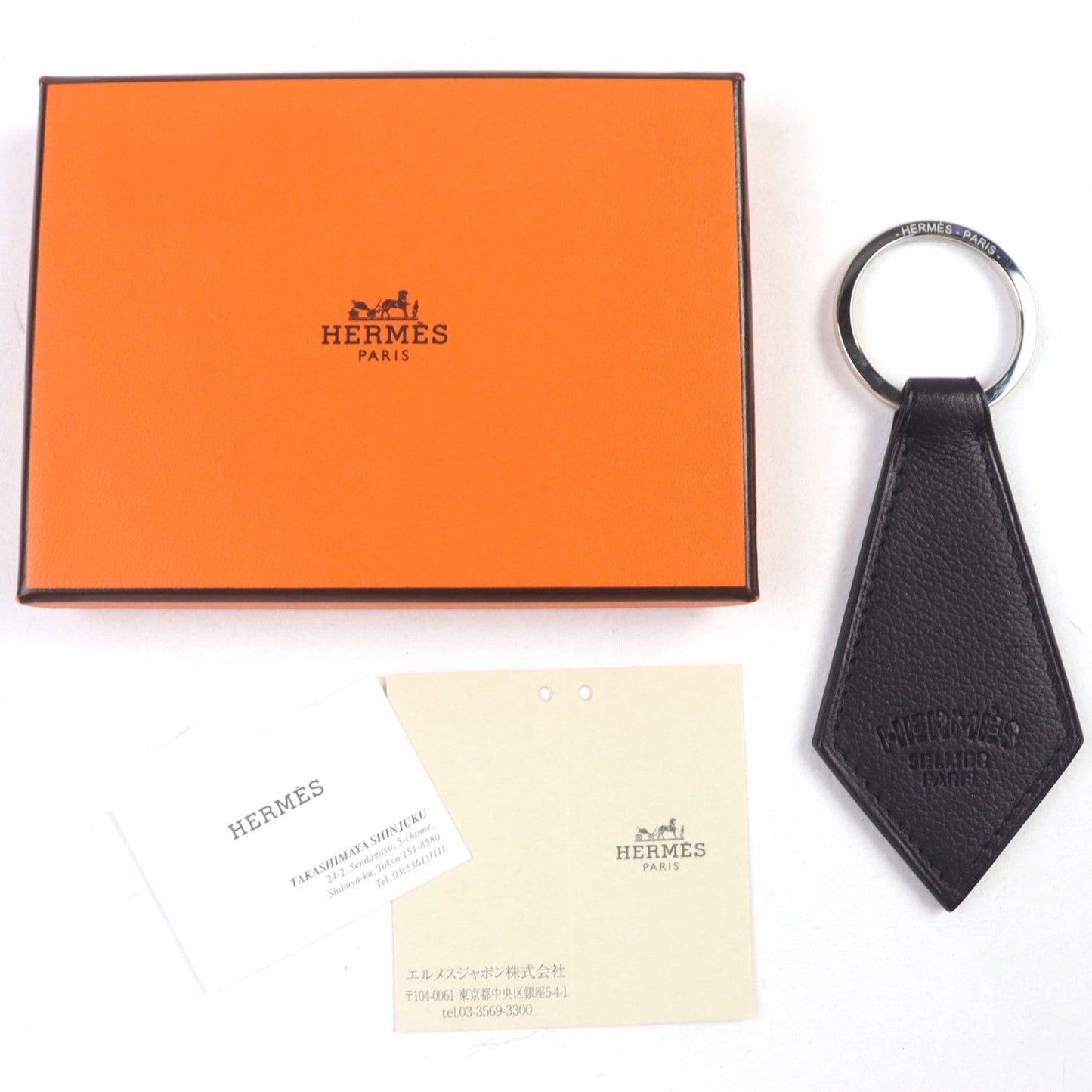 HERMES key ring leather Dark brown Porte cles Tab