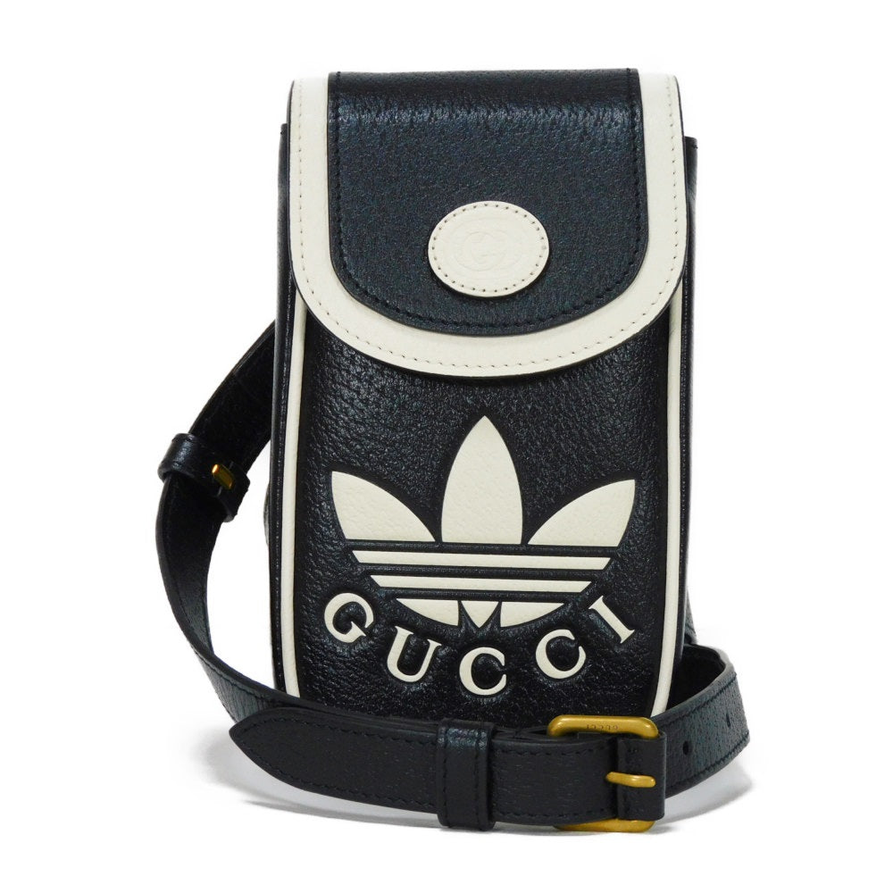 GUCCI Shoulder Bag 721794 AAA8K 8495 Textured leather black Trefoil logo white in good condition Interlocking G Adidas Phone Holder mens