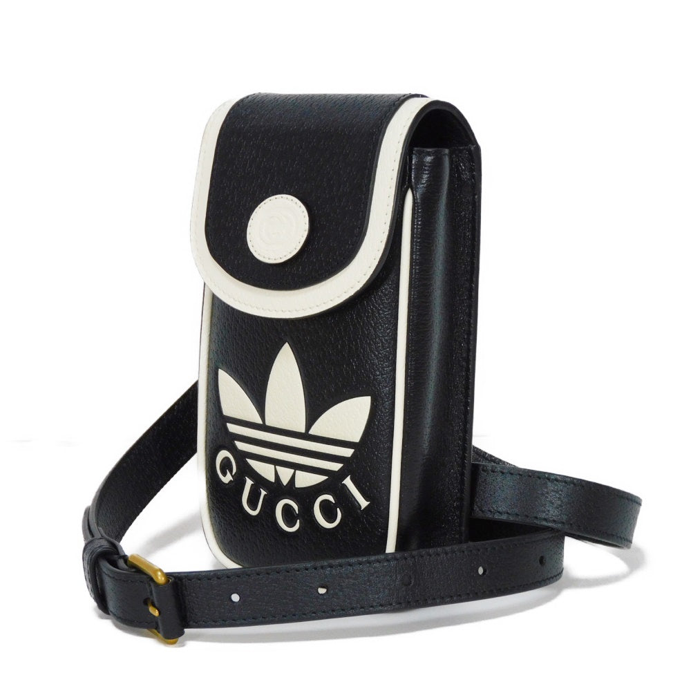 GUCCI Shoulder Bag 721794 AAA8K 8495 Textured leather black Trefoil logo white in good condition Interlocking G Adidas Phone Holder mens