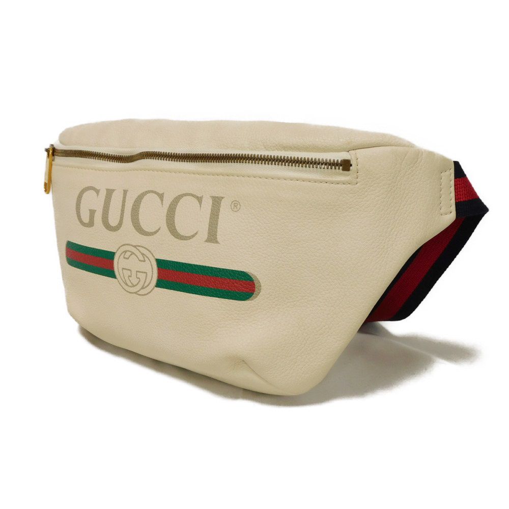 GUCCI Sling bag 530412 0GCCT 8822 Textured leather Ivory Vintage logo print medium belt bag
