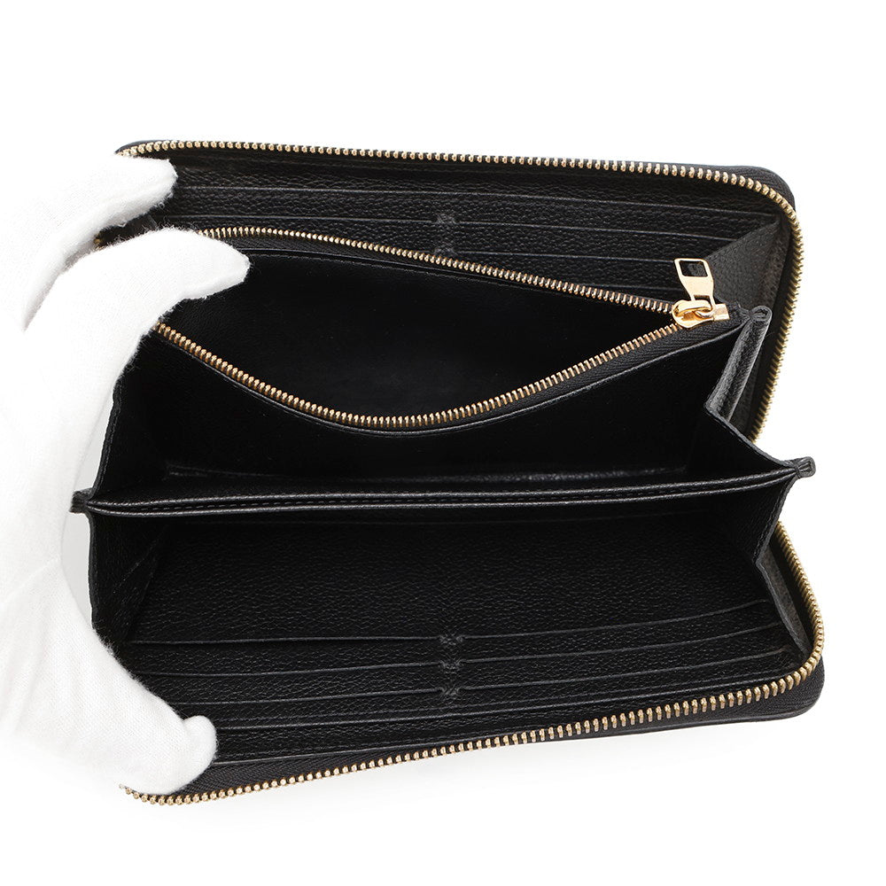 LOUIS VUITTON Zippy Wallet Noir/BeigeM64805 Monogram Empreinte Leather