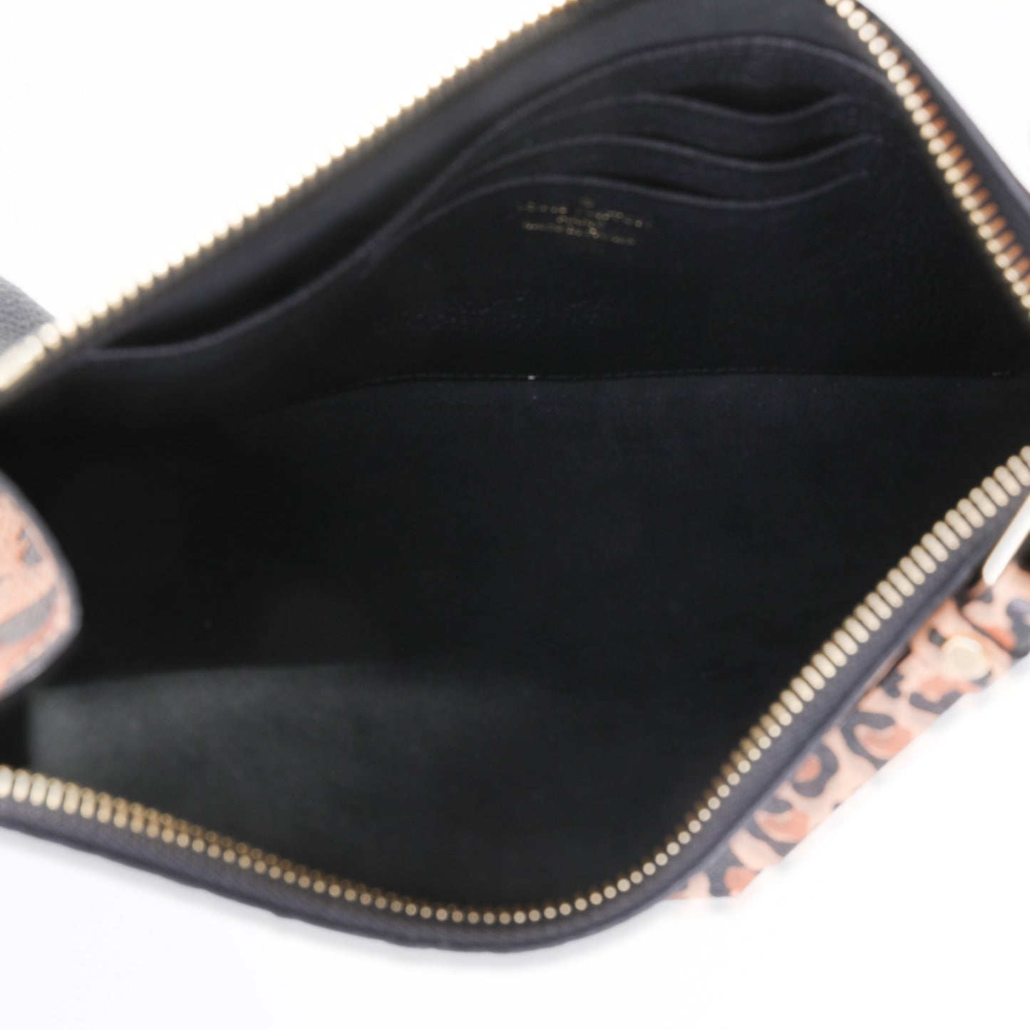 Louis Vuitton Louis Vuitton Black Monogram Empreinte Wild at Heart Melanie Pochette