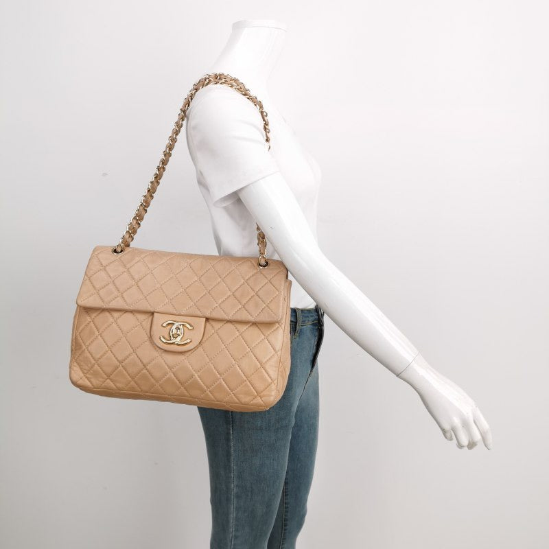 Chanel Classic Flap Maxi Beige Latte Lambskin Leather Giant Gold-tone CC Logo