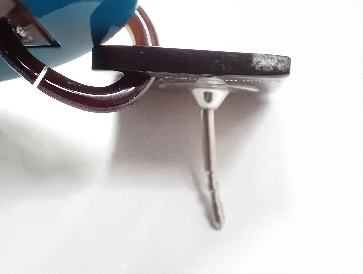 Hermès Blue Lacquered Buffalo Horn H Round Earrings