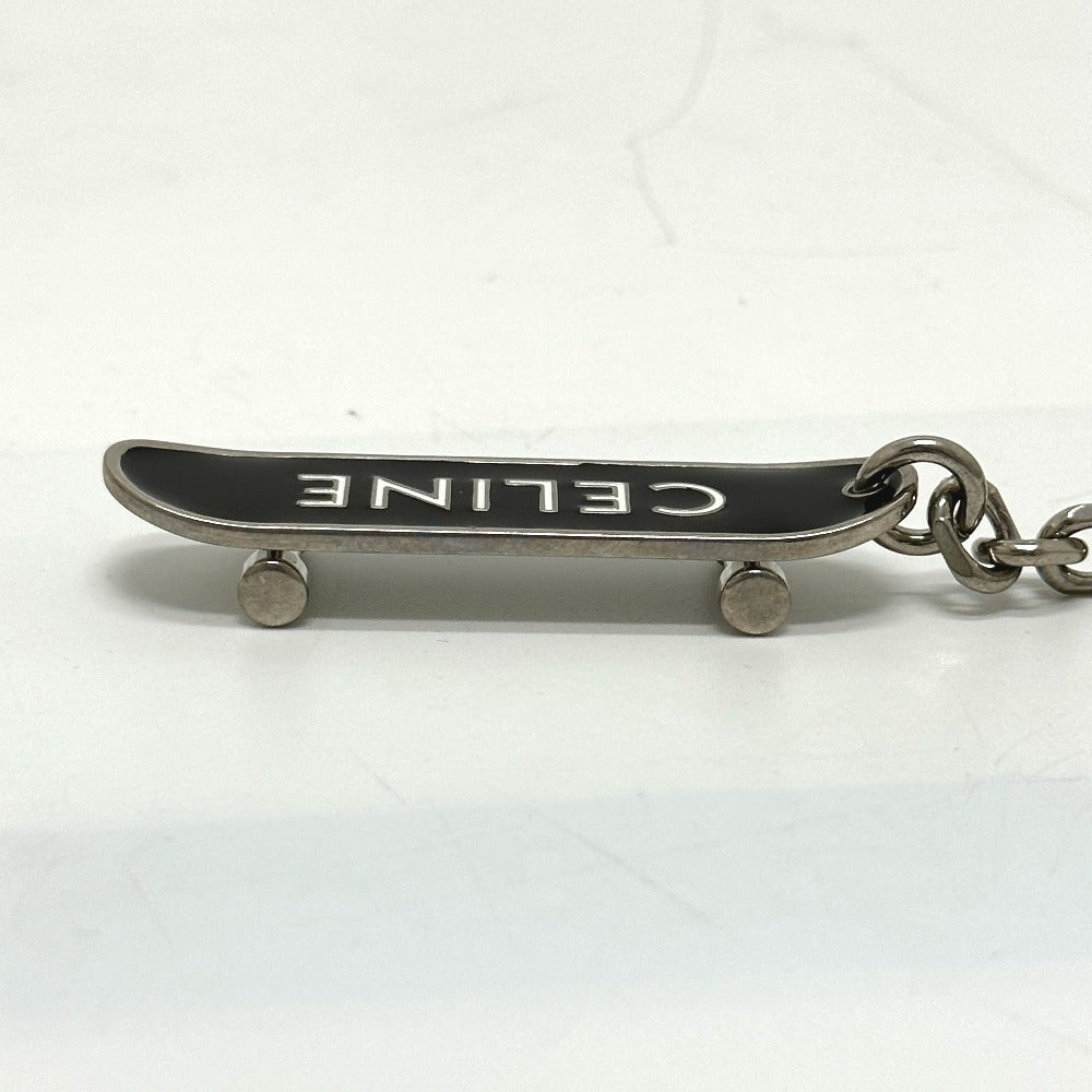 CELINE key ring metal black skateboard mens