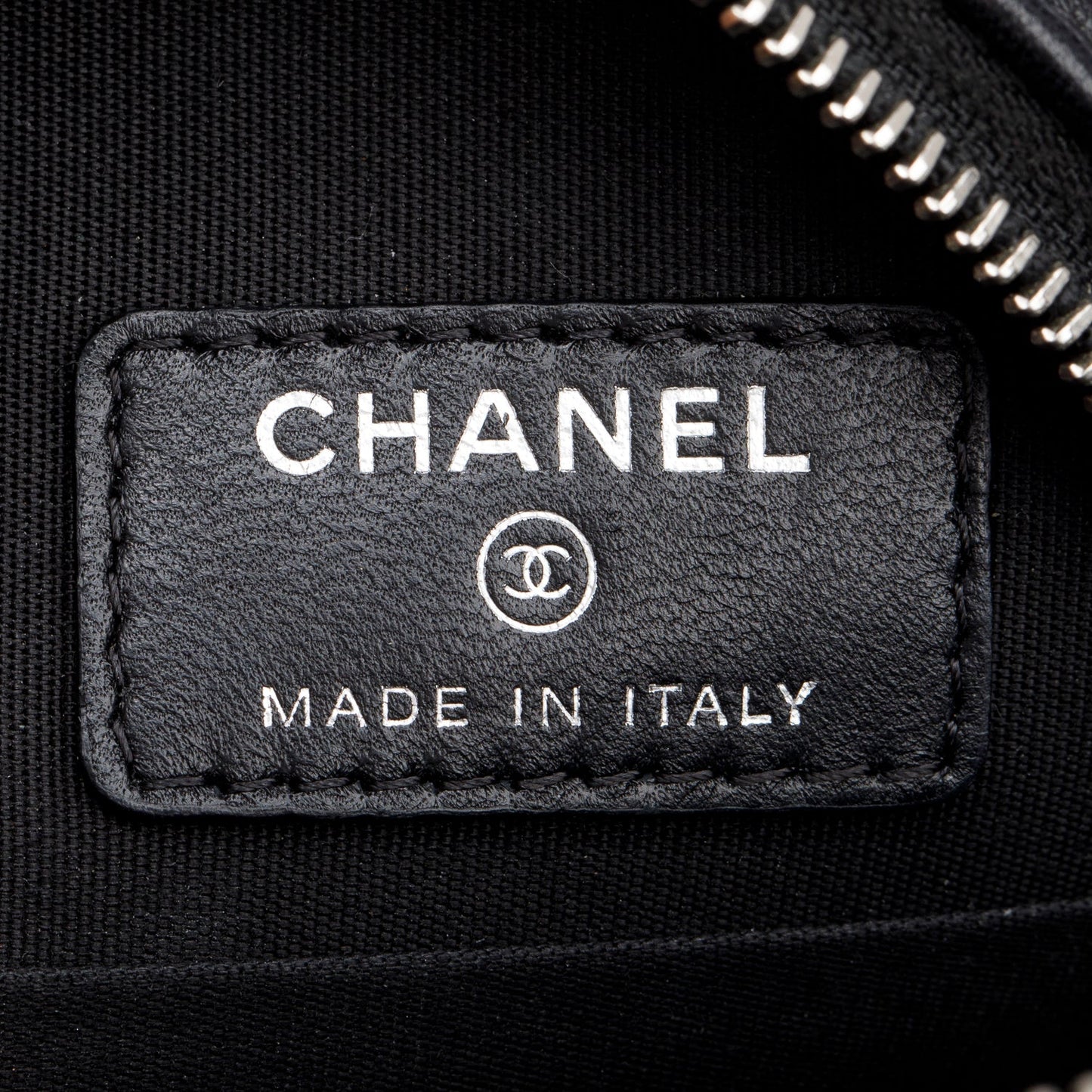 Chanel Black Caviar Camellia Embossed Round Clutch