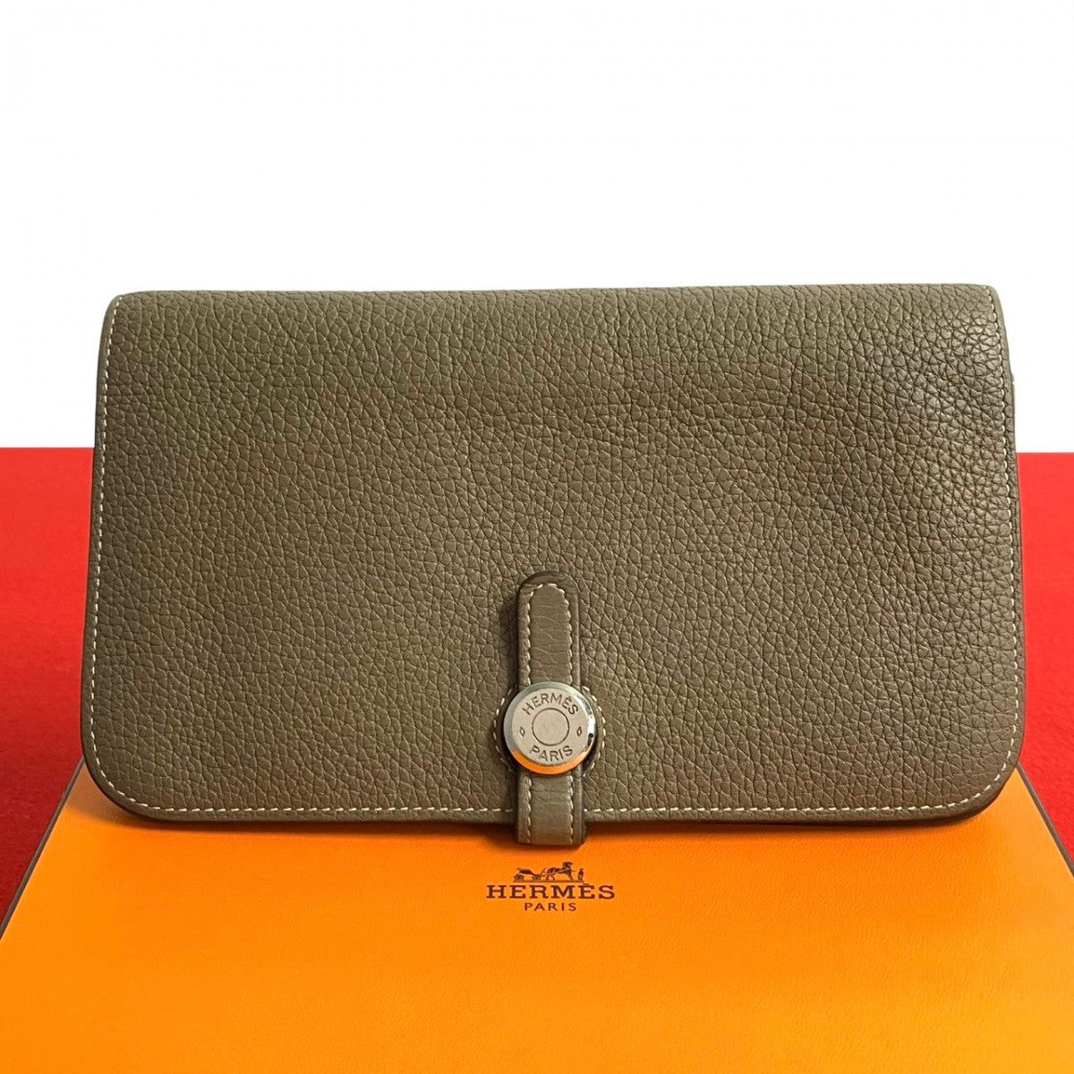 HERMES Bifold Wallet Taurillon Clemence Togon GM