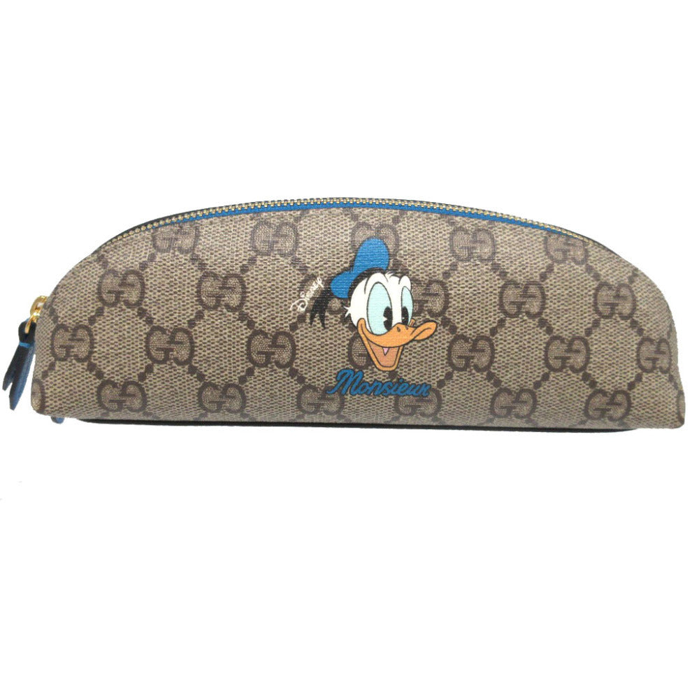GUCCI pencil case 662129 GG Supreme, Leather beige Pencil case Donald Duck Disney collaboration Women