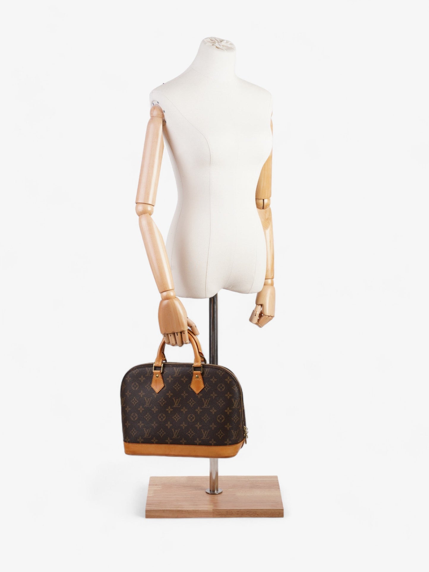 Louis Vuitton Alma Monogram Coated Canvas PM