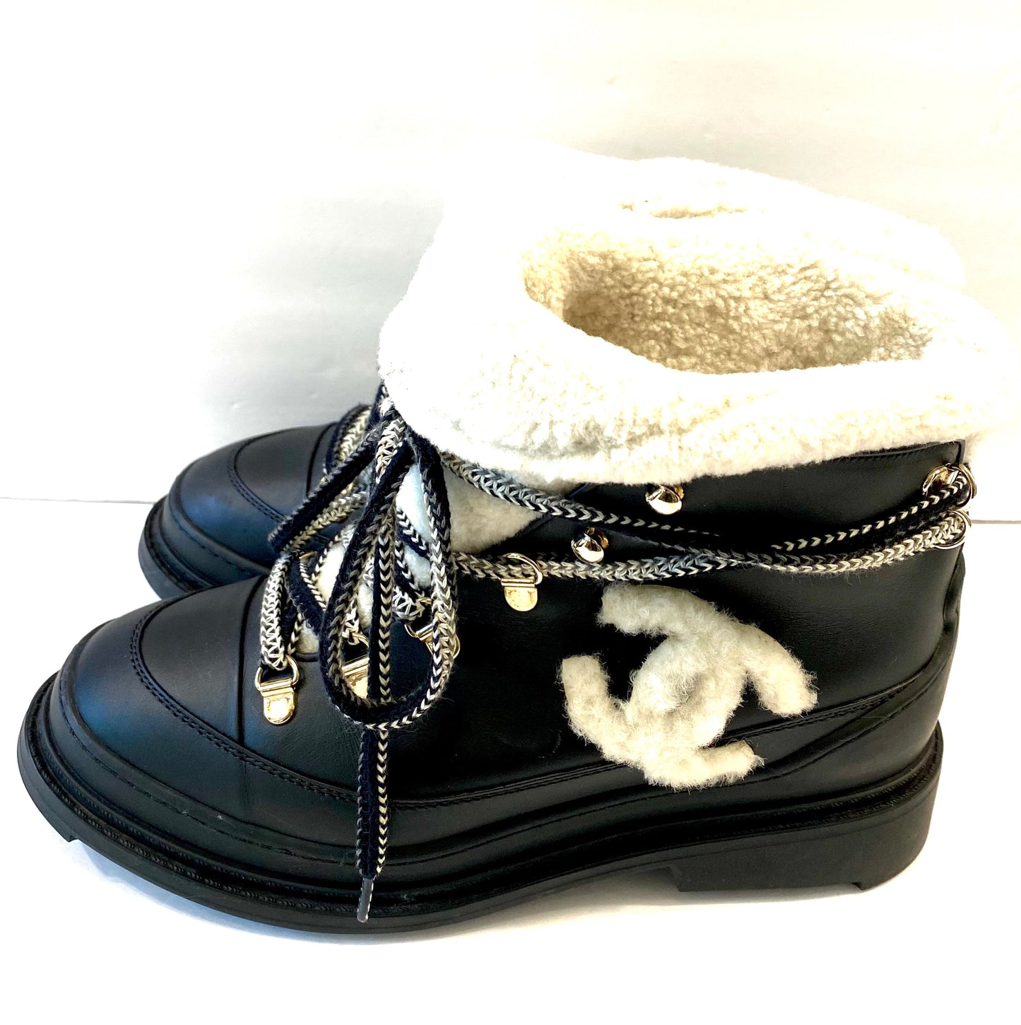 CHANEL CC CALFSKIN LEATHER SHEARLING LACE-UP BOOTS