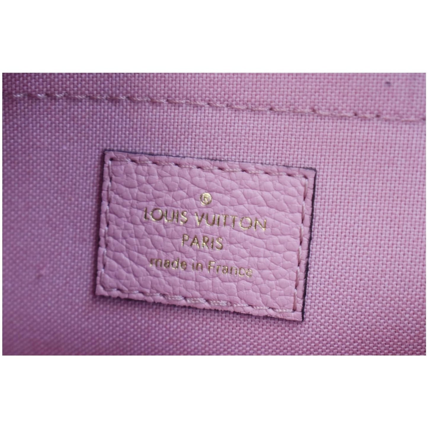 LOUIS VUITTON Daily Pouch Monogram Empreinte Leather Clutch Rose Poudre - 20% OFF