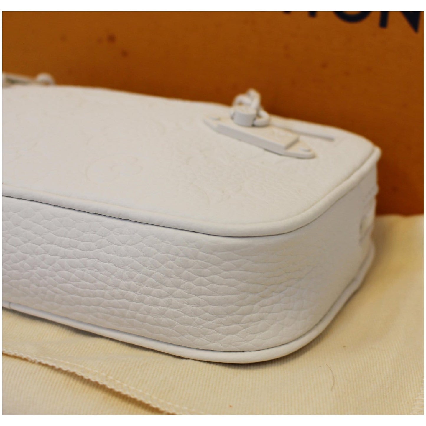 LOUIS VUITTON Pochette Volga Monogram Clutch Bag White