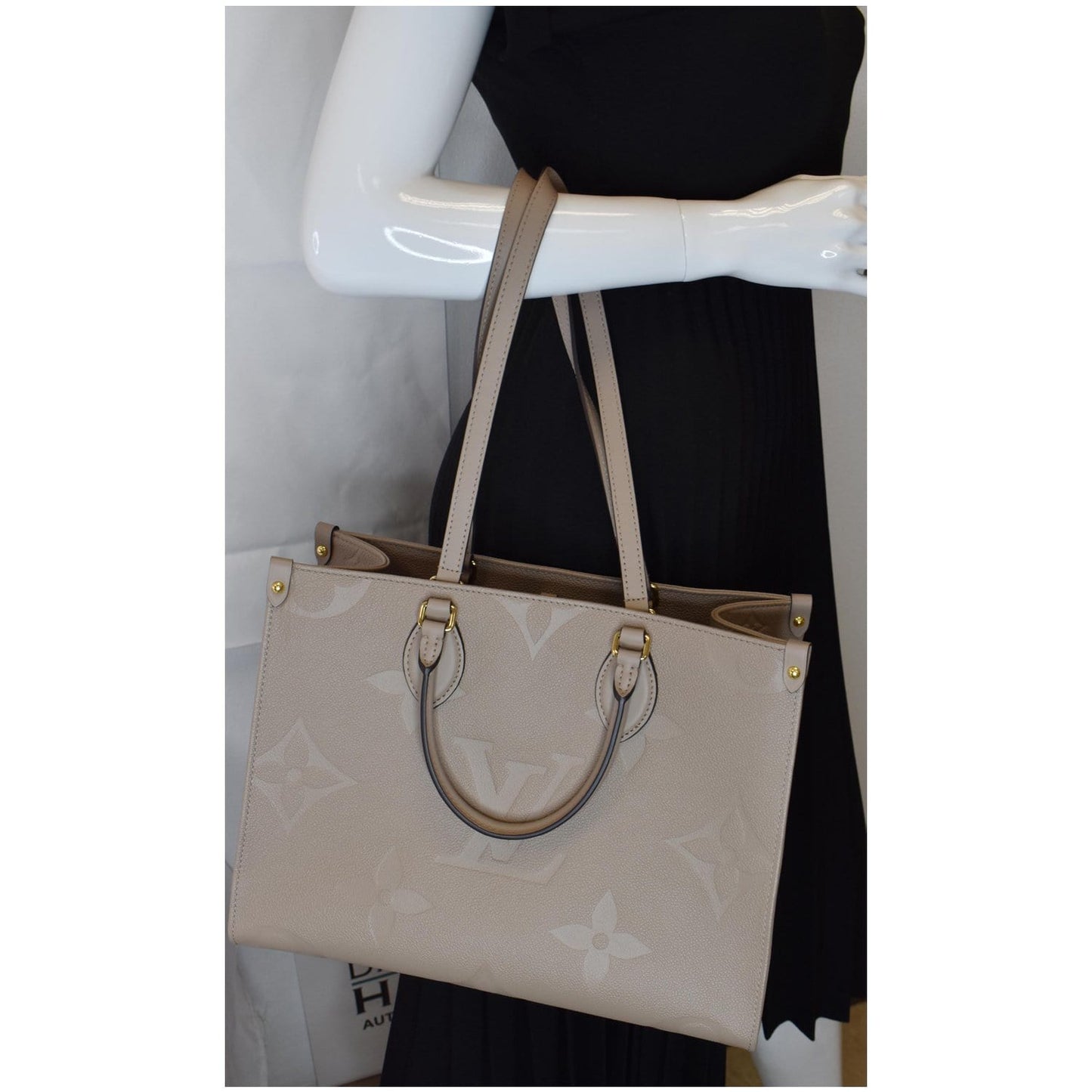 LOUIS VUITTON Onthego MM Monogram Empreinte Shoulder Bag Tourterelle - 15% OFF