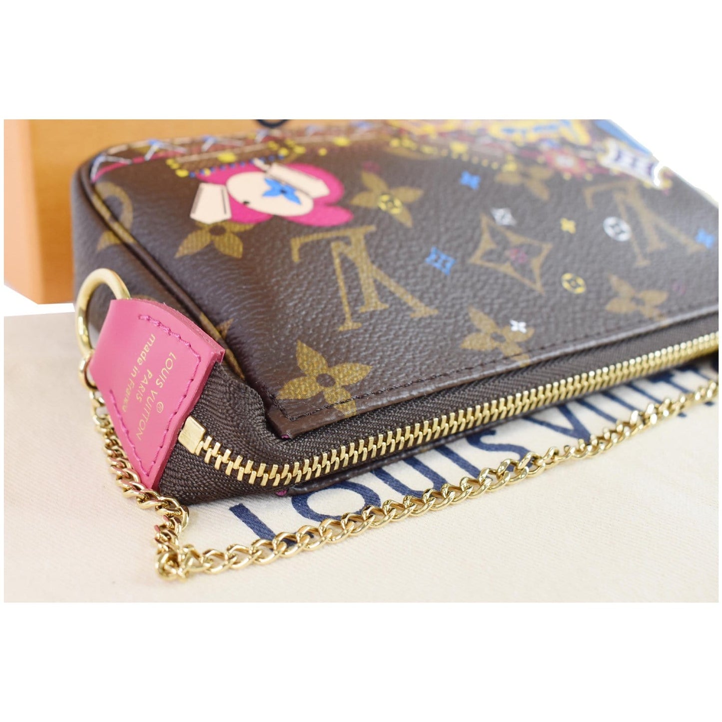 LOUIS VUITTON Mini Pochette Christmas Monogram Canvas Accessoires Pouch Brown