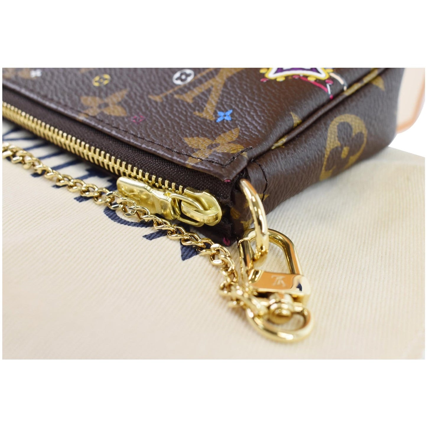 LOUIS VUITTON Mini Pochette Christmas Monogram Canvas Accessoires Pouch Brown