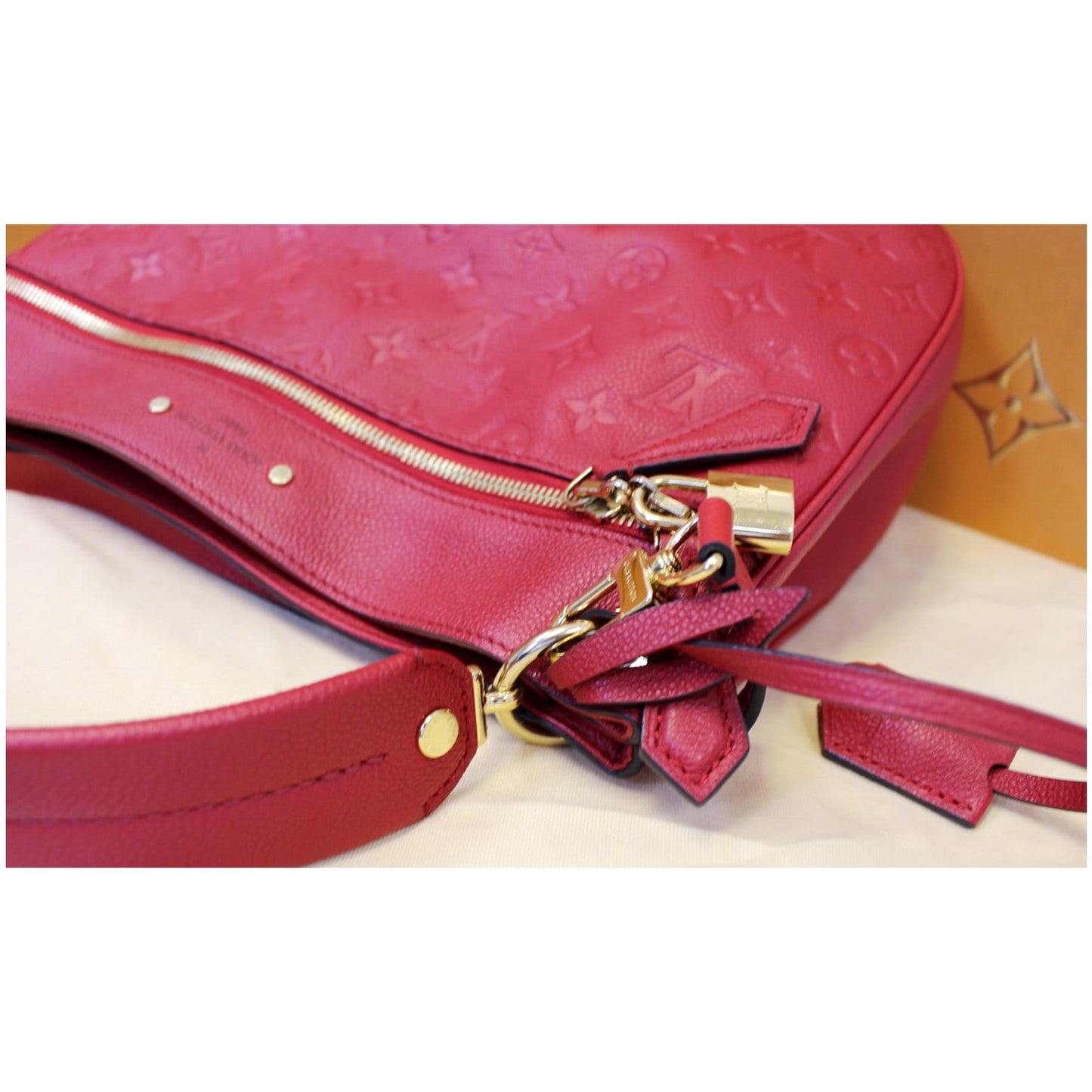 LOUIS VUITTON Spontini Empreinte Leather Shoulder Bag Red