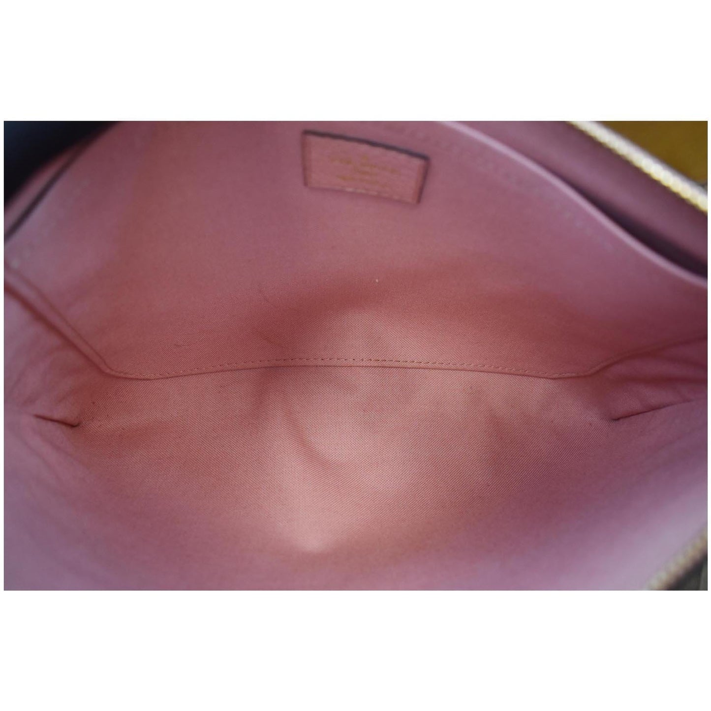 LOUIS VUITTON Daily Pouch Monogram Empreinte Leather Clutch Rose Poudre - 20% OFF
