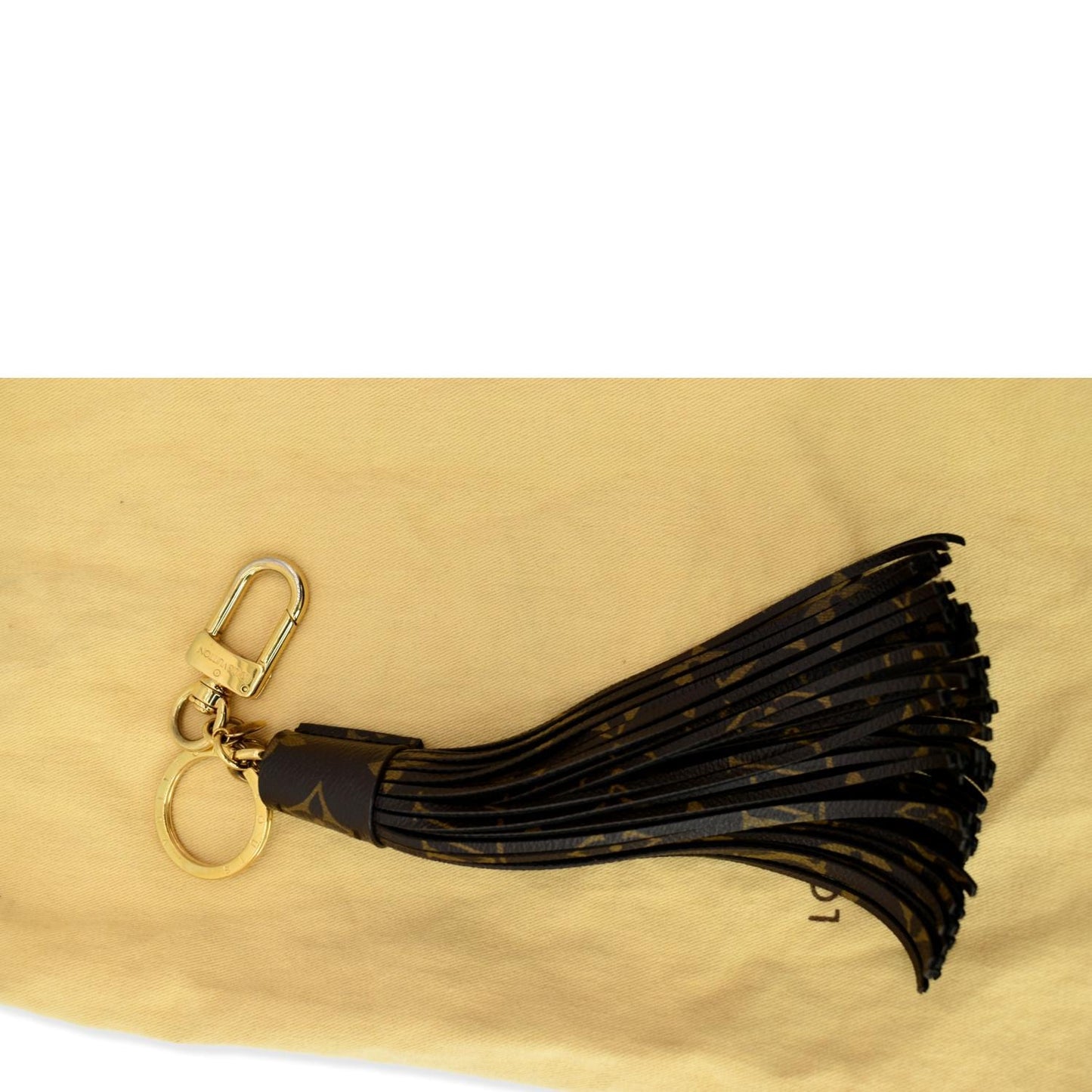 LOUIS VUITTON Monogram Canvas Tassel Bag Charm Brown