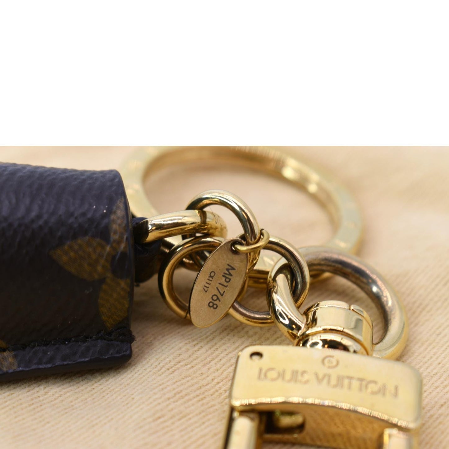LOUIS VUITTON Monogram Canvas Tassel Bag Charm Brown