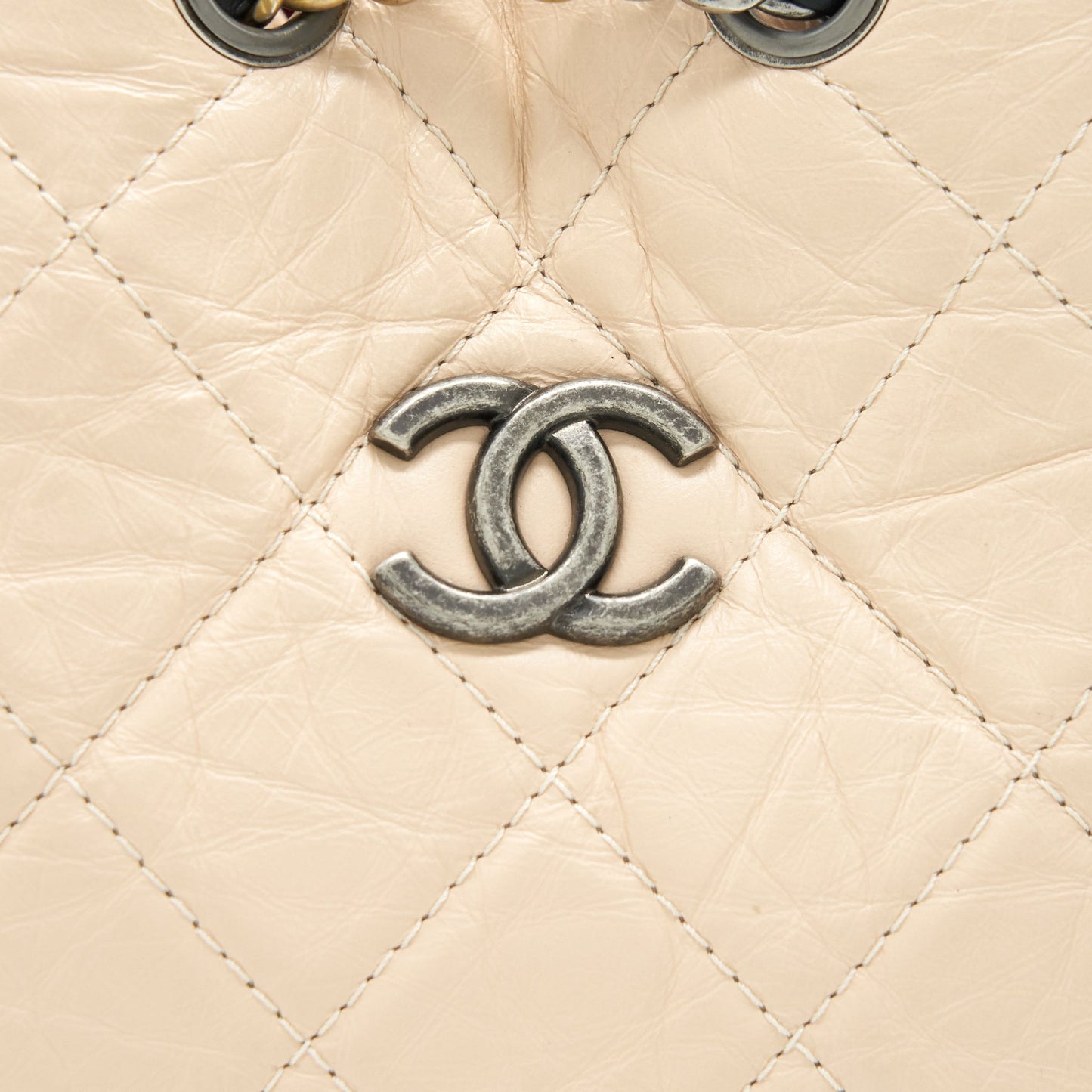 CHANEL GABRIELLE BACKPACK IN AGED CALFSKIN QUILTED LEATHER BEIGE