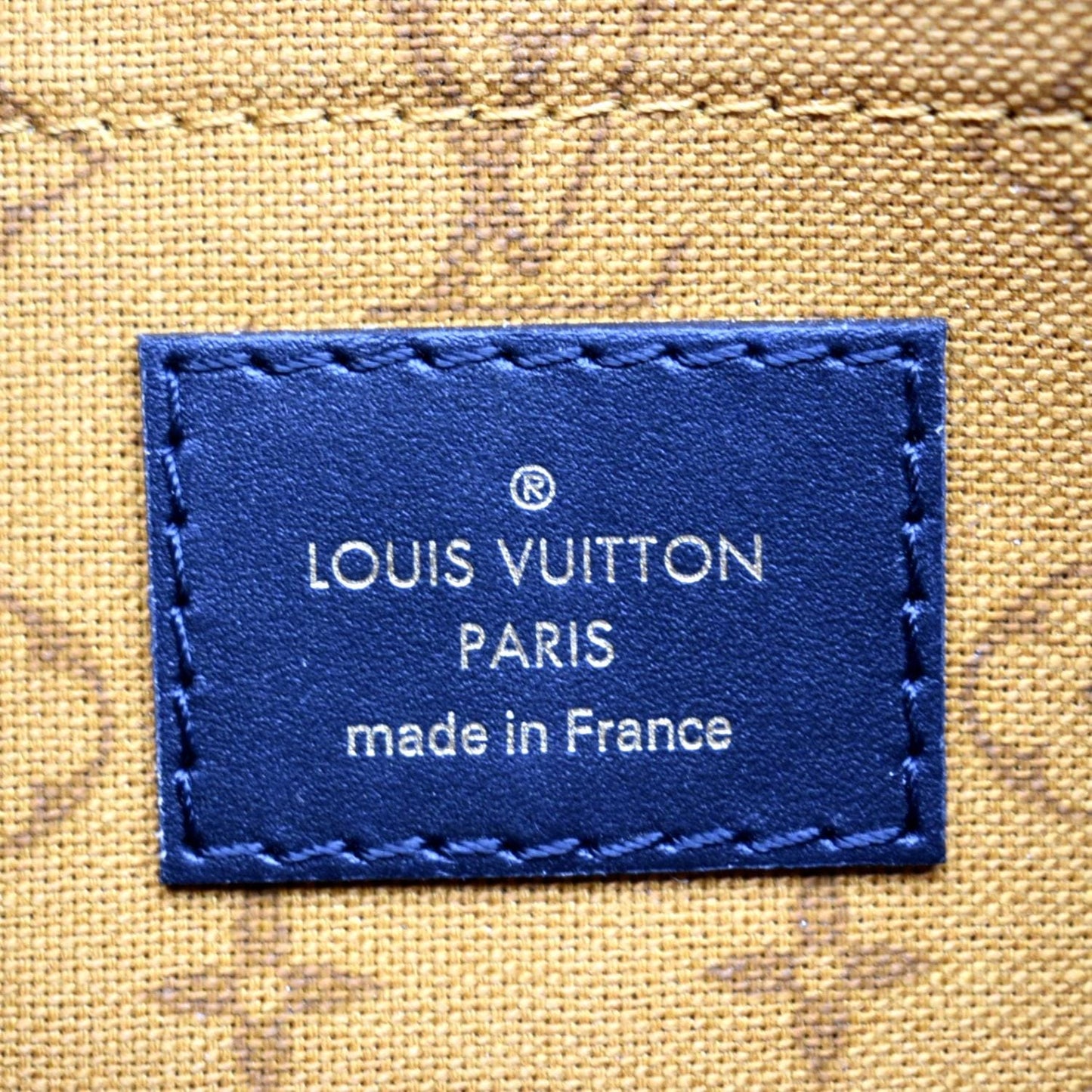 LOUIS VUITTON Neverfull Crafty Monogram Giant Wristlet Pouch Brown