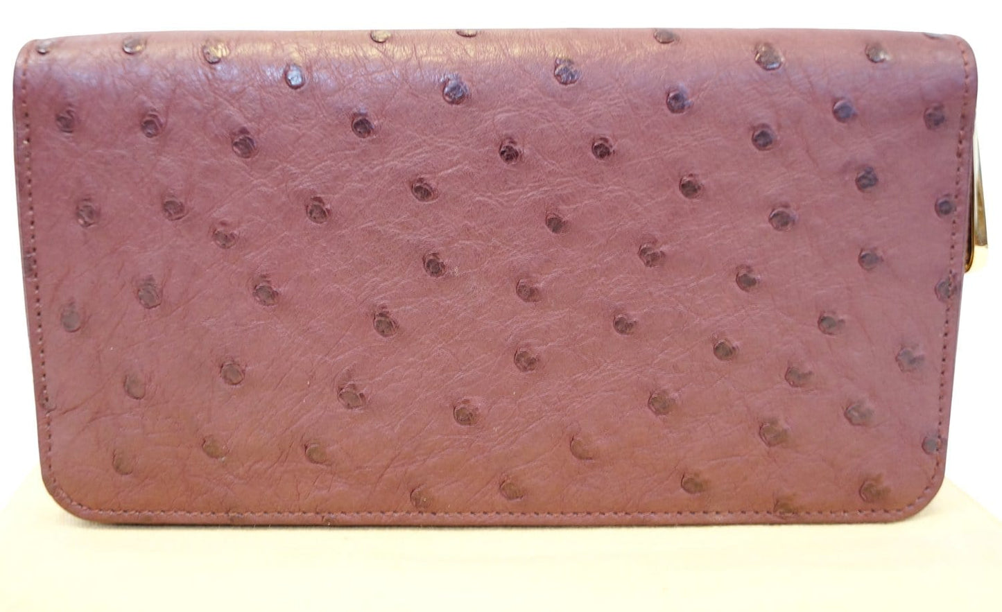 LOUIS VUITTON Burgundy Ostrich Leather Zippy Wallet - Sale