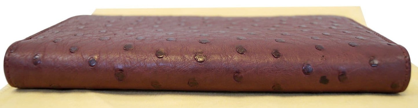 LOUIS VUITTON Burgundy Ostrich Leather Zippy Wallet - Sale