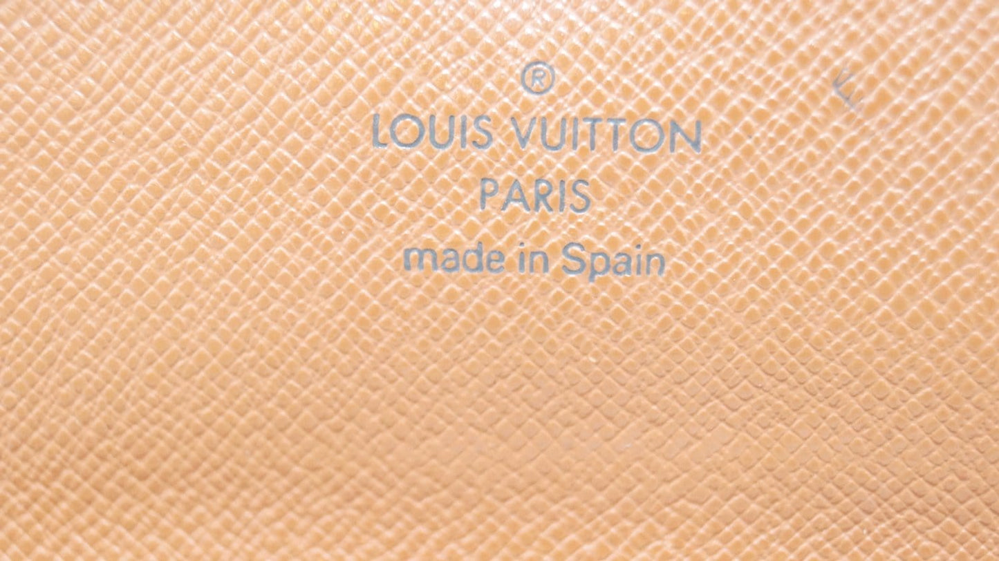 LOUIS VUITTON Monogram Canvas Long Flap Sarah Wallet