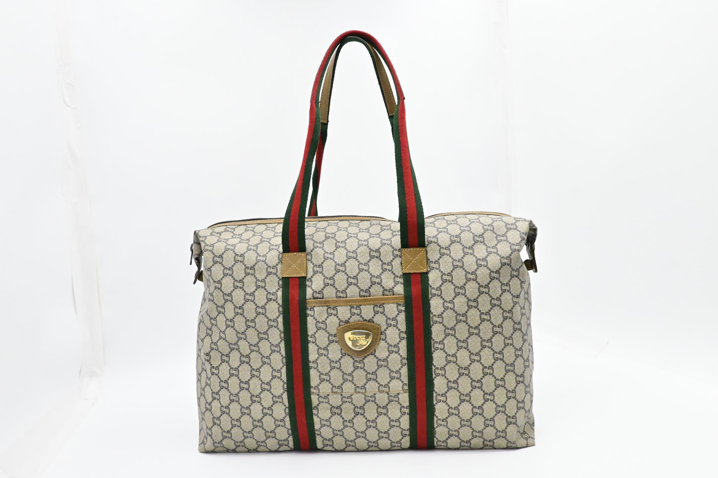 Gucci Plus Zipped Travel Bag in GG Plus Coated Canvas