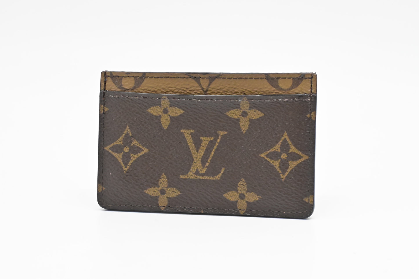 Louis Vuitton Card Case in Reverse Monogram Canvas