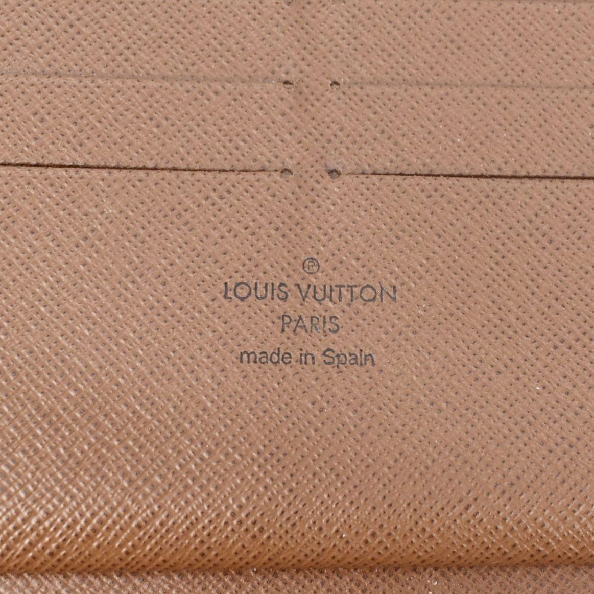 LOUIS VUITTON Monogram Canvas Zippy Wallet Brown