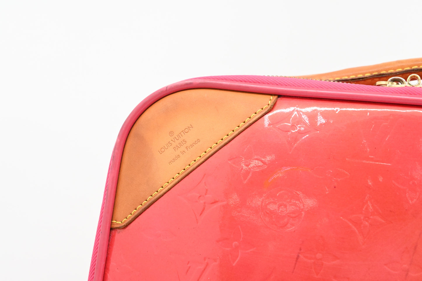 Louis Vuitton Pegase 45 in Grapefruit Vernis Leather