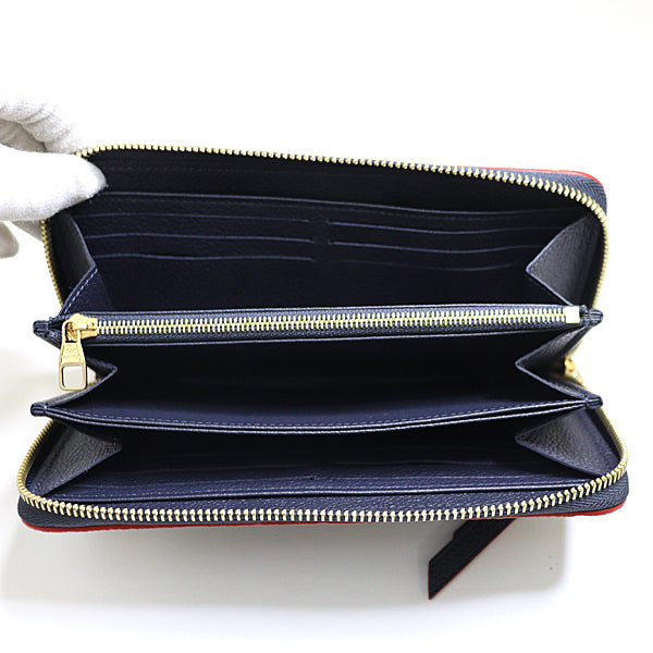 LOUIS VUITTON Long Wallet Purse M62121 Monogram Empreinte leather Navy Monogram ï¿½E An plant Zippy wallet Women