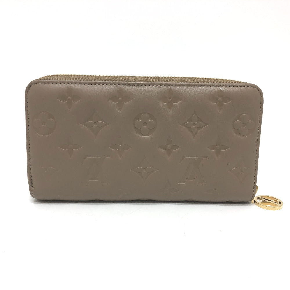 LOUIS VUITTON Long Wallet Purse M81511 leather Beige type Monogram emboss Zippy wallet