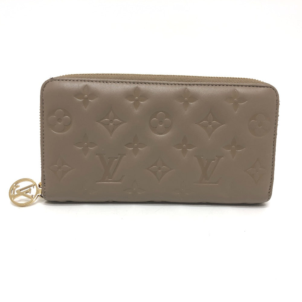 LOUIS VUITTON Long Wallet Purse M81511 leather Beige type Monogram emboss Zippy wallet