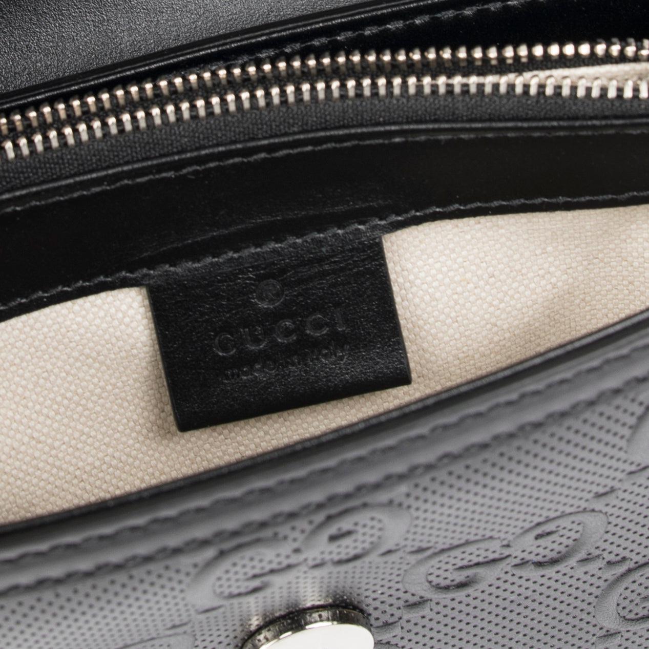 Gucci Black GG Embossed Messenger Bag