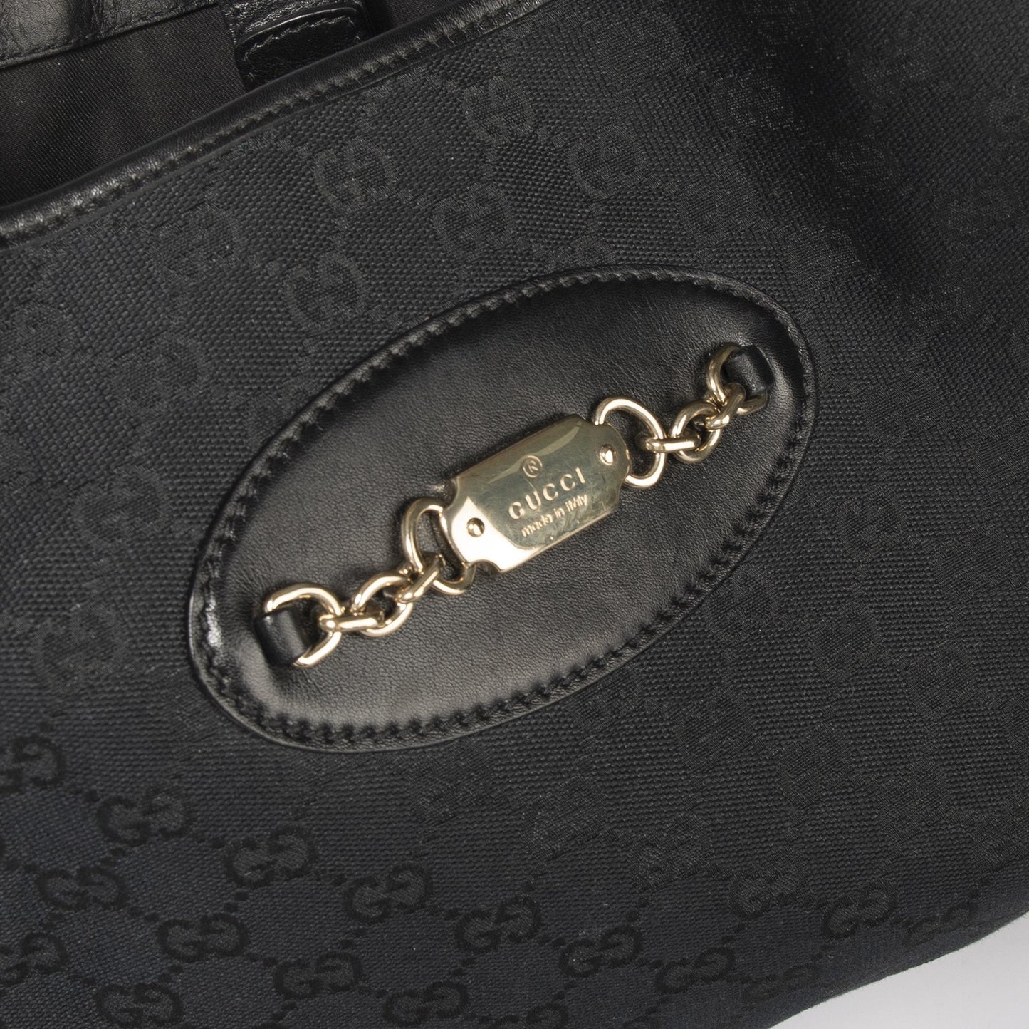 Gucci GG Canvas Punch Hobo