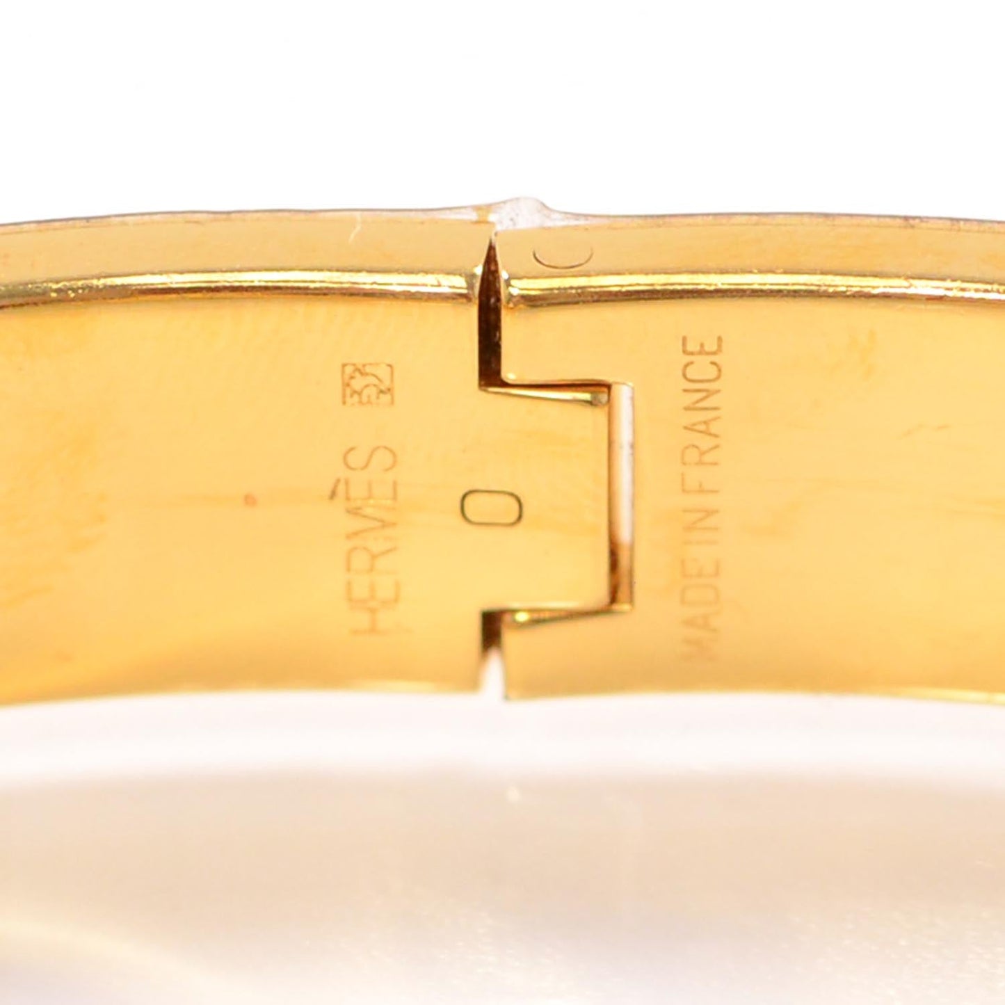 HERMÈS ENAMEL NARROW CLIC CLAC H BRACELET IN GREEN