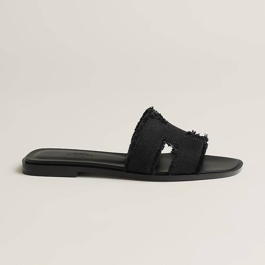 HERMÈS FRINGED LINEN ORAN SANDALS