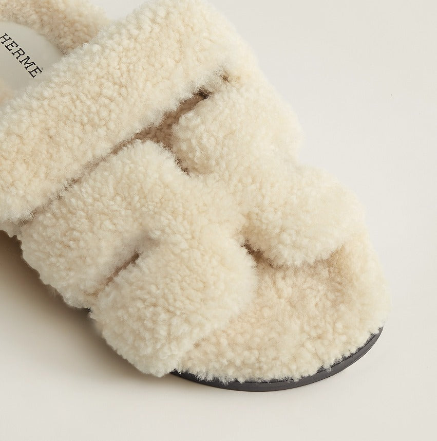 HERMÈS WOOLSKIN CHYPRE MULES SANDALS