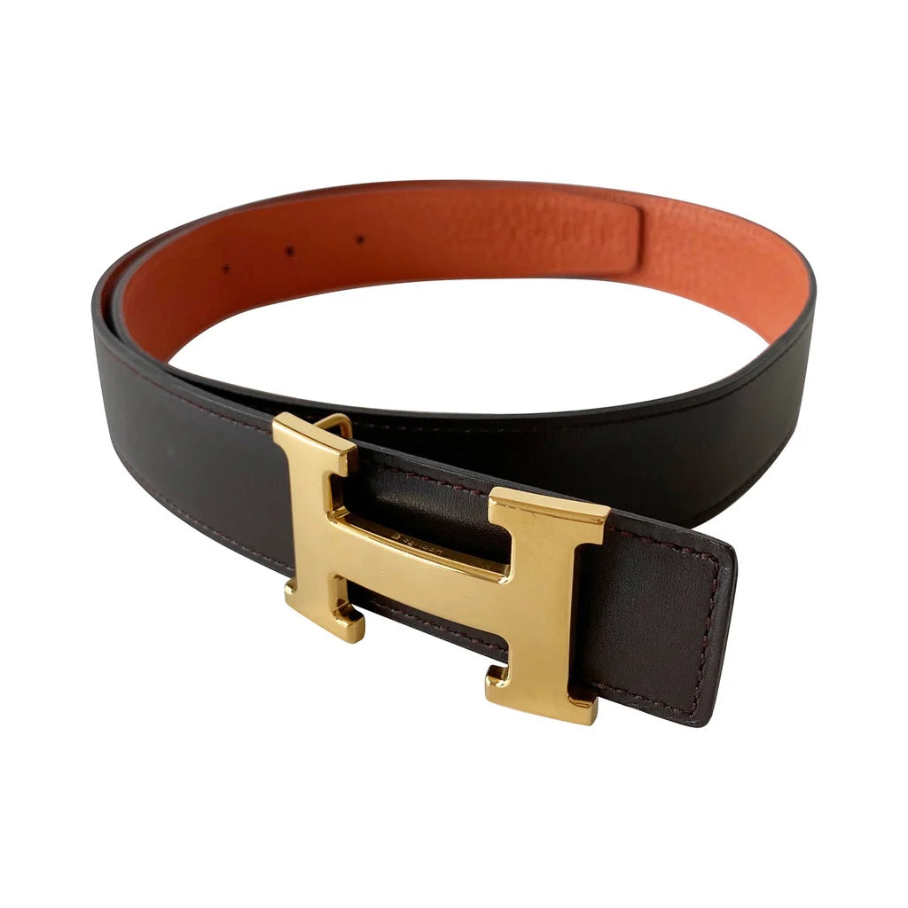 HERMÈS CONSTANCE H REVERSIBLE LEATHER BELT IN ORANGE NOIR